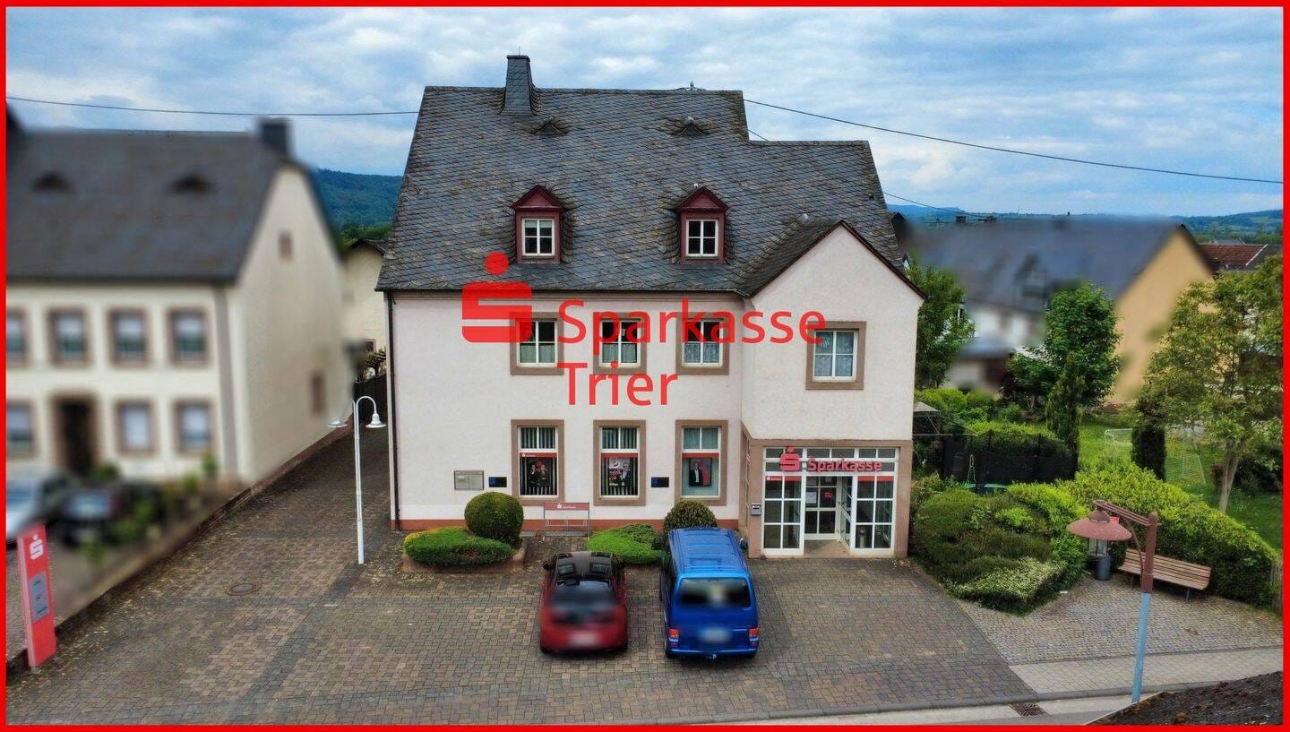 Immobilie in Kenn - Attraktives Wohn- und Geschäftshaus mit Entwicklungspotenzial in Kenn! - Bild 0
