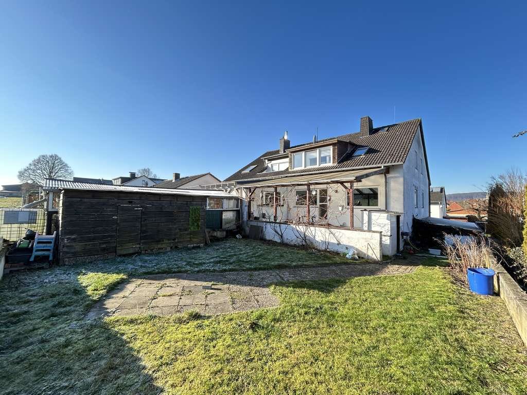Immobilie in Warburg - Charmante Doppelhaushälfte mit Garten, Terrasse, Garage in Warburg-Bonenburg - Bild 1