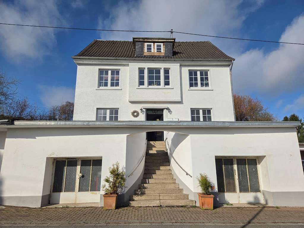 Immobilie in Birkenbeul - Mehrfamilienhaus mit großem Grundstück, ehemaligem Gewerbeteil und vielfältigem Entwicklungspotenzia - Bild 4