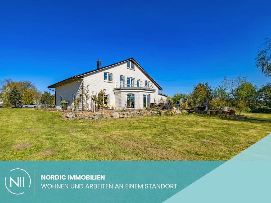 Immobilie in Bollingstedt - Wohnen und Arbeiten an einem Standort – Lagerhalle, Betriebsleiterwohnung und Wohnhaus - Bild 0