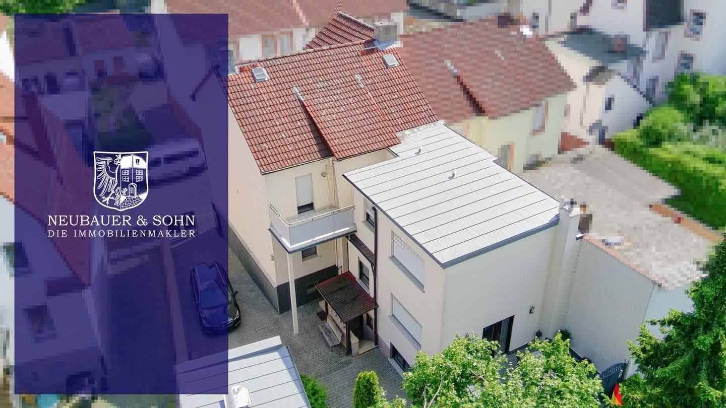 Immobilie in Obertshausen - Zweifamilienhaus mit großer Terrasse und Garten - Bild 0