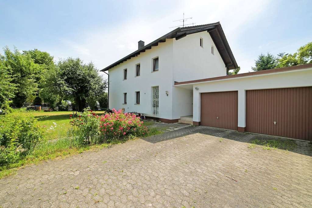 Immobilie in Kirchheim bei München - Wohnen im Grünen - Gartenwohnung in zentraler Lage mit Perspektive - Bild 1