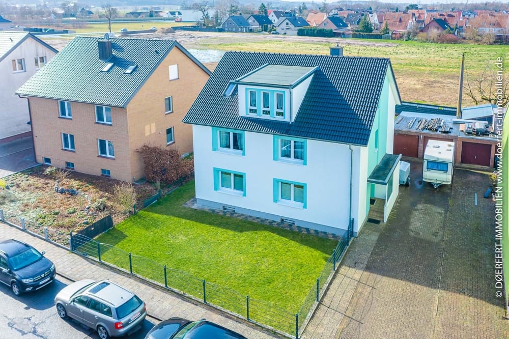 Immobilie in Bissendorf - Osnabrück - Bissendorf | Mehrfamilienhaus mit Terrassenbereich in sehr zentraler und ruhiger Lage - Bild 2