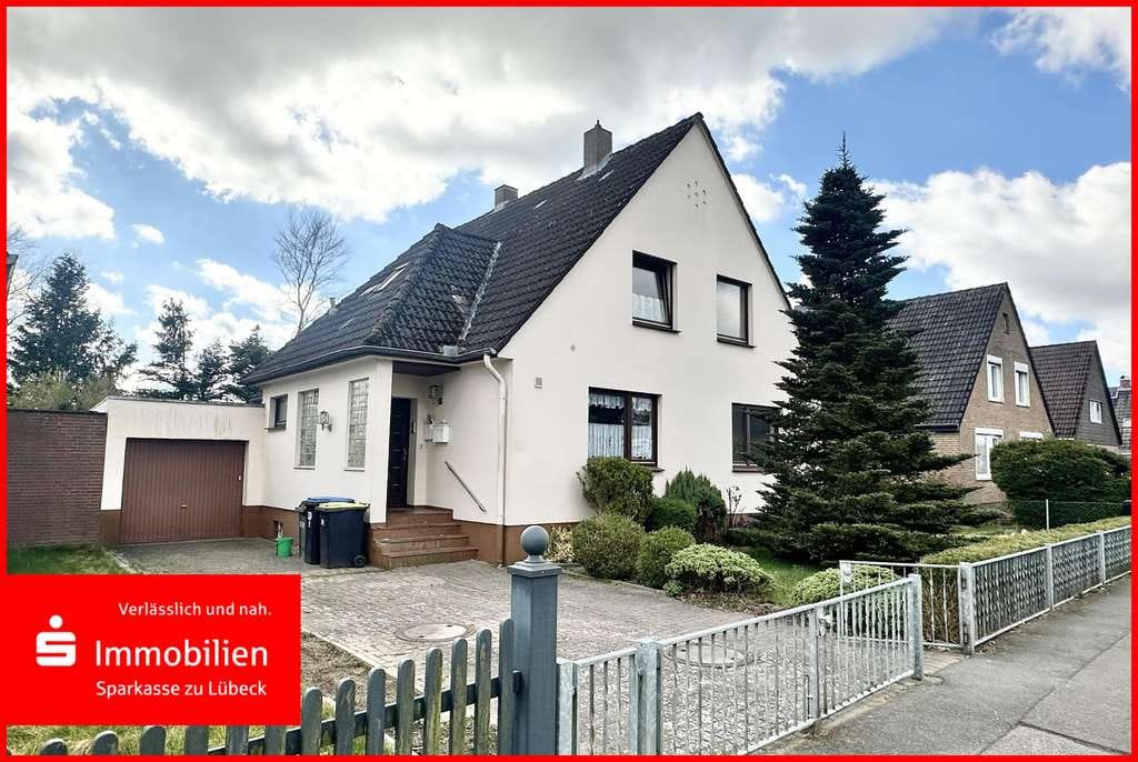 Immobilie in Stockelsdorf - Einfamilienhaus mit vermieteter Einliegerwohnung  - Bild 0