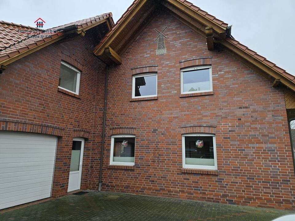 Immobilie in Friesoythe - Attraktives Einfamilienhaus mit Einliegerwohnung in Friesoythe/Edewechterdamm I Garage I Wärmepumpe - Bild 0