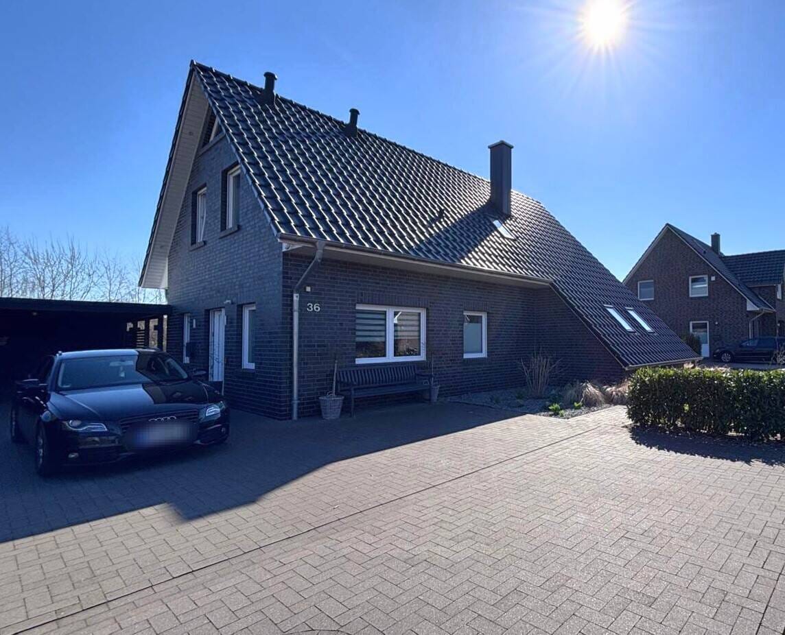 Immobilie in Dötlingen - Jung, modern & familienfreundlich - Ihr neues Zuhause in ruhiger Lage mit Blick ins Grüne - Bild 1