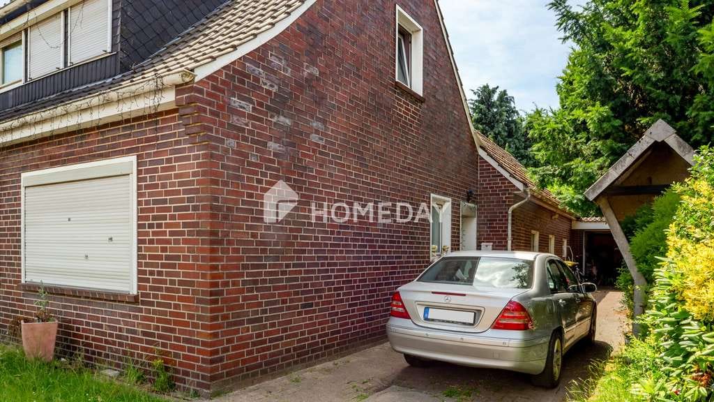 Immobilie in Twistringen - Charmantes Einfamilienhaus in Twistringen-Scharrendorf mit Garten und Potenzial - Bild 1