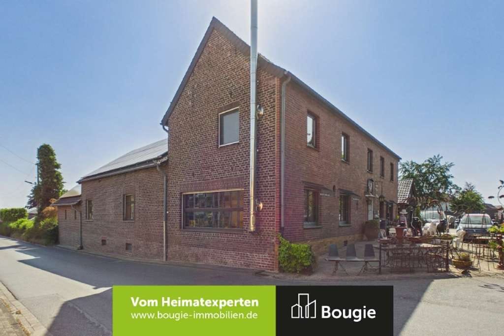 Immobilie in Gangelt - Wohnen mit Zukunft - Zweifamilienhaus inklusive Baugrundstück - Bild 0