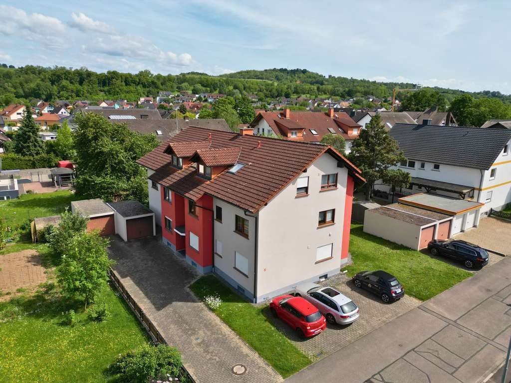 Immobilie in Ringsheim - Helle 3,5-Zimmer-Erdgeschosswohnung mit Gartenzugang, Balkon & Garage in ruhiger Lage - Bild 1