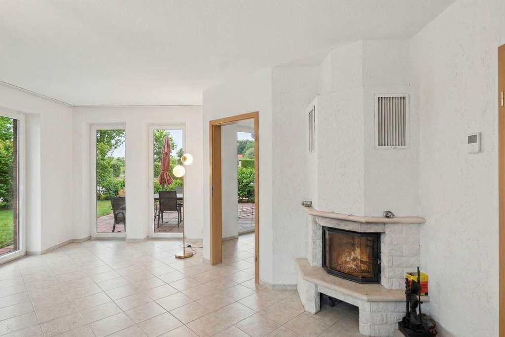 Immobilie in Kalkhorst - Ostseenah und gepflegt, Bungalow mit Kamin und Feldlage - Bild 2