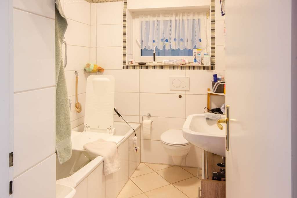 Immobilie in Warstein - Charmantes Mehrfamilienhaus mit Ausbaupotenzial – perfekt für Kapitalanleger oder Eigennutzer - Bild 2