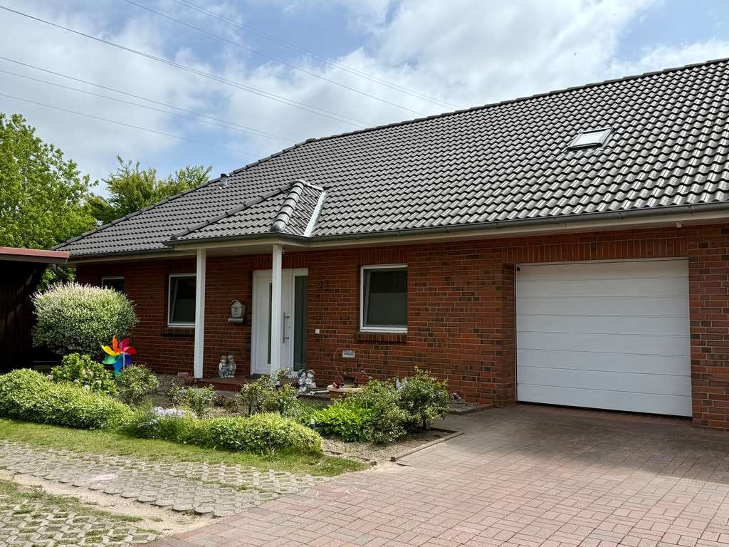 Immobilie in Mildstedt - Ebenerdige DHH, BJ 2012 mit Wintergarten, Garage und Ausbaureserve - Bild 0