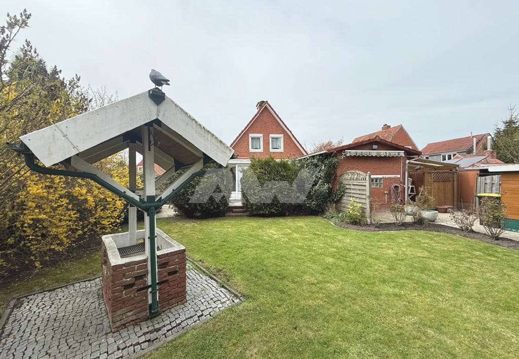 Immobilie in Hinte - Gepflegtes Wohnhaus mit Wintergarten und parkähnlichem Garten in Hinte - Bild 1