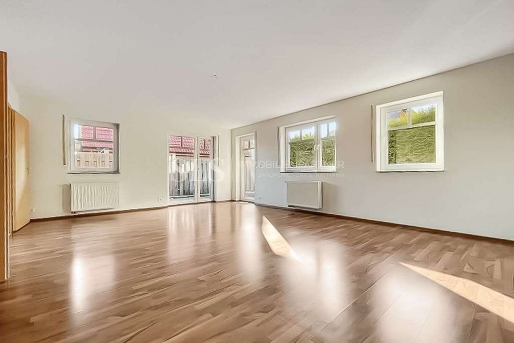 Immobilie in Raesfeld - Vier Zimmer auf zwei Ebenen mit Terrasse, Gartenanteil, Garage und rund 132 m² Wohnfläche - Bild 2