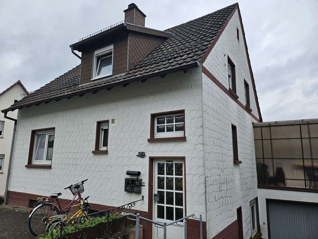 Immobilie in Rodalben - Zweifamilienhaus mit großem Garten und Garage - Bild 0