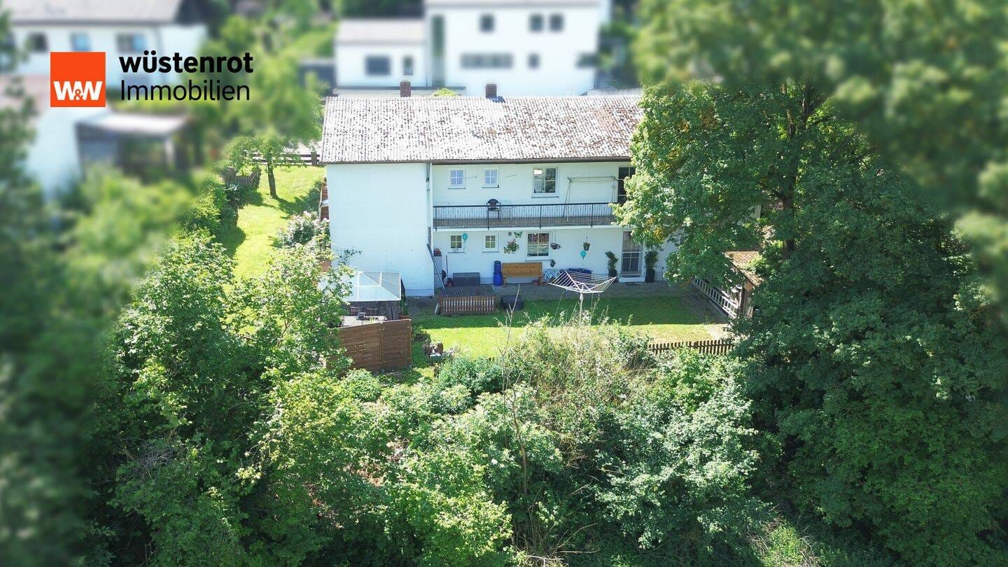 Immobilie in Nittendorf - Zweifamilienhaus mit vermieteter Einliegerwohnung und bezugsfreiem Obergeschoss - Bild 4