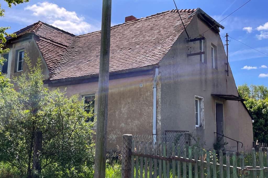 Immobilie in Löbau - Doppelhaushälfte mit Nebengebäude und Grundstück - Bild 0