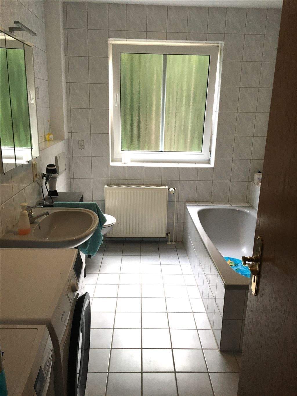 Immobilie in Hude (Oldenburg) - Vermietete 3-Zimmer-Wohnung mit Balkon und Carport in gepflegter Eigentumsanlage! - Bild 3