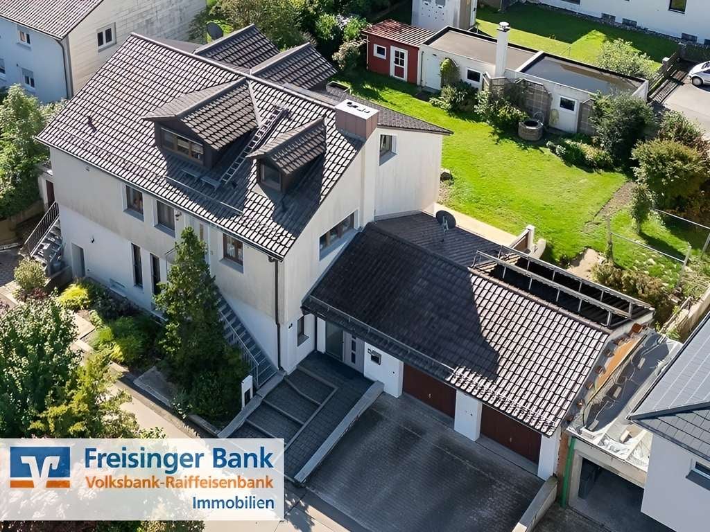 Immobilie in Zolling - Flexibles 4-Parteien-Haus in Zolling: Perfekt für Anleger, Eigennutzer oder Mehrgenerationen - Bild 0