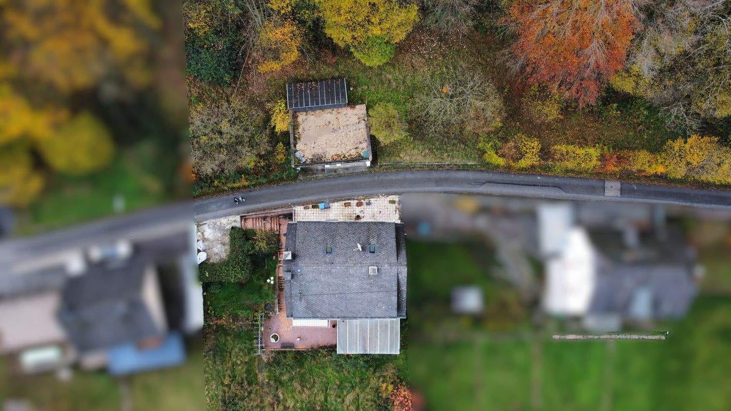 Immobilie in Malberg - Riesiges Grundstück I Teilrenoviert I 2 Wohneinheiten I Blick in die Natur - Bild 1
