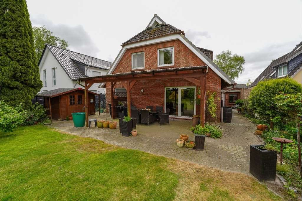 Immobilie in Geestland - Haus mit Garten und Garage in ruhiger Lage Geestland/Langen - als Wohnungseigentum (WEG) - Bild 0