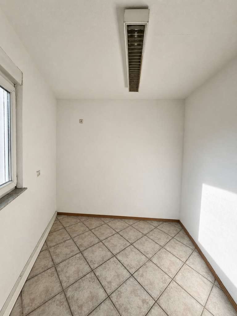 Immobilie in Reichenbach an der Fils - Sichere Kapitalanlage mit Mietpotenzial: 2-Zi-Whg. + Garage - Bild 2