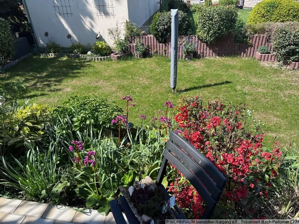 Immobilie in Bodenheim - Gepflegte DHH mit gutem Raumkonzept und schönem Garten in ruhiger Wohnlage - Bild 1