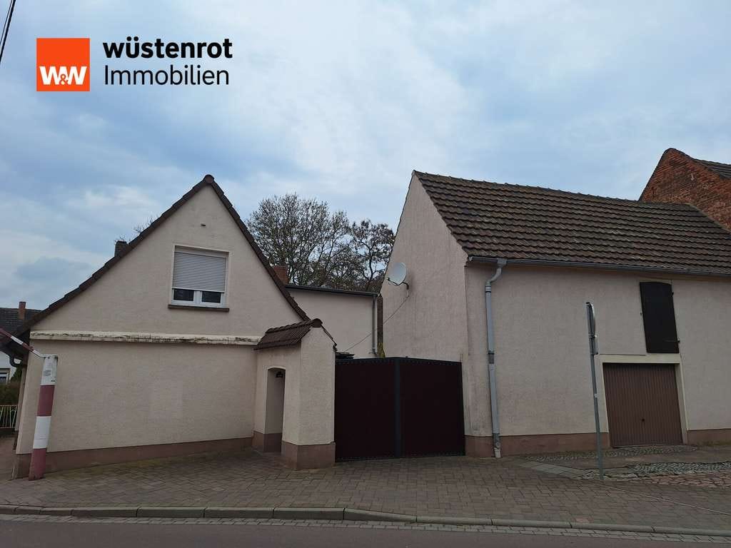 Immobilie in Osternienburger Land - Wohnen mit Perspektive in Wulfen – Einfamilienhaus mit Garten, Garage und Raum für Ihre Ideen - Bild 1