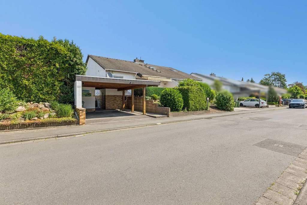 Immobilie in Pohlheim - Gepflegte Doppelhaushälfte in ruhiger Feldrandlage mit Pool und Garten - Bild 0