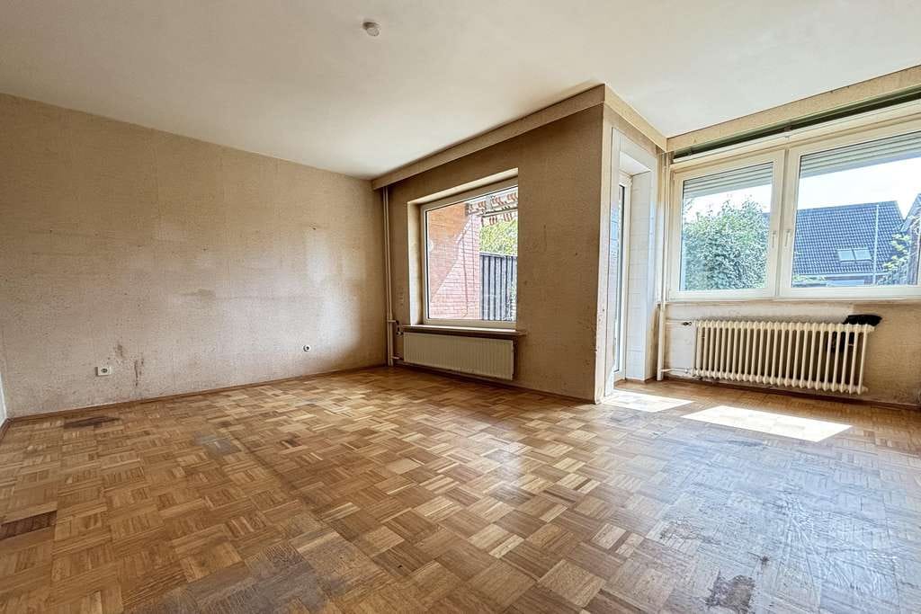 Immobilie in Bad Schwartau - Charmantes Mittelreihenhaus mit Potential in ruhiger Wohnlage - Bild 2