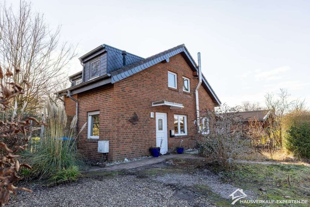 Immobilie in Hamminkeln - Entspanntes Wohnen am Wochenende – Haus mit Kamin und Garten - Bild 0