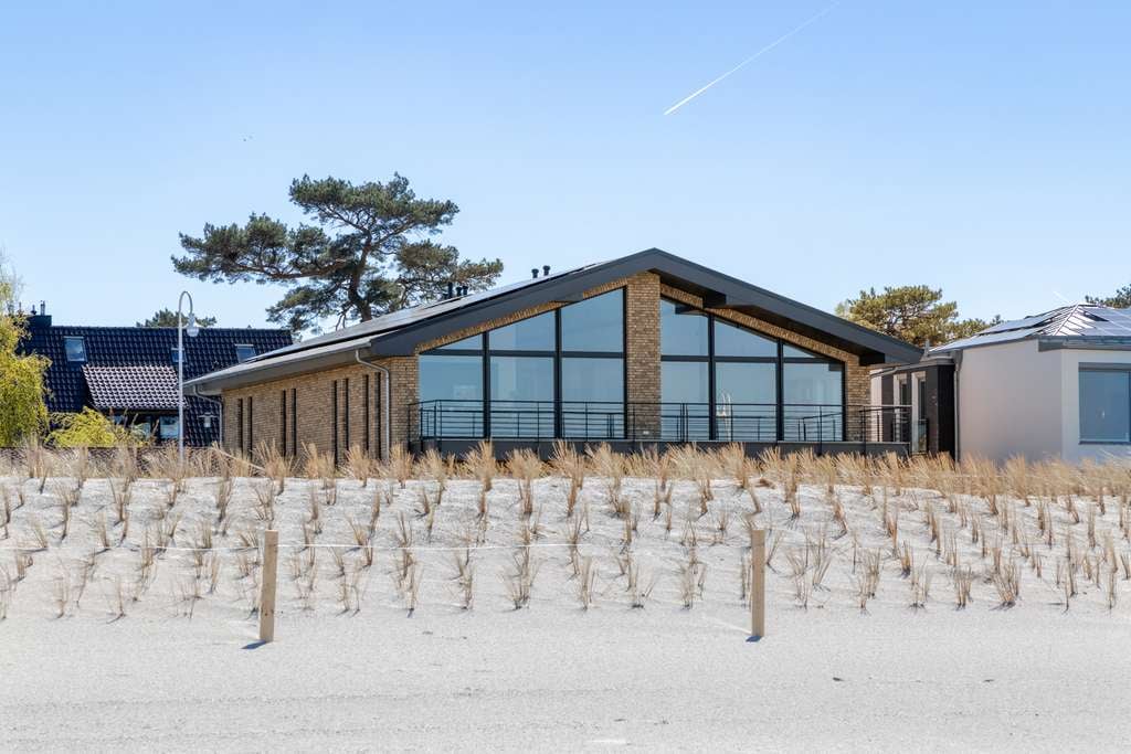 Immobilie in Sagard - Exklusive Eigentumswohnung mit direktem Meerblick im Ostseebad Glowe auf Rügen - Bild 1