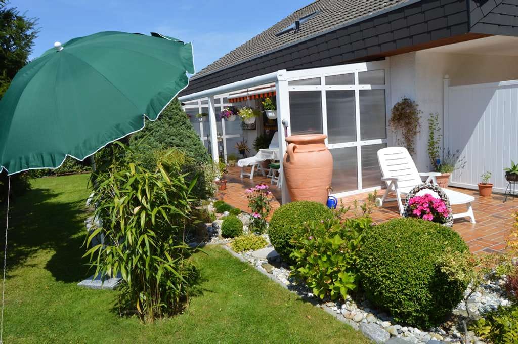 Immobilie in Werl - Einfamilienhaus (freistehend) mit Einliegerwohnung, Souterrainwohnbereich + Kellerräumlichkeiten - Bild 2