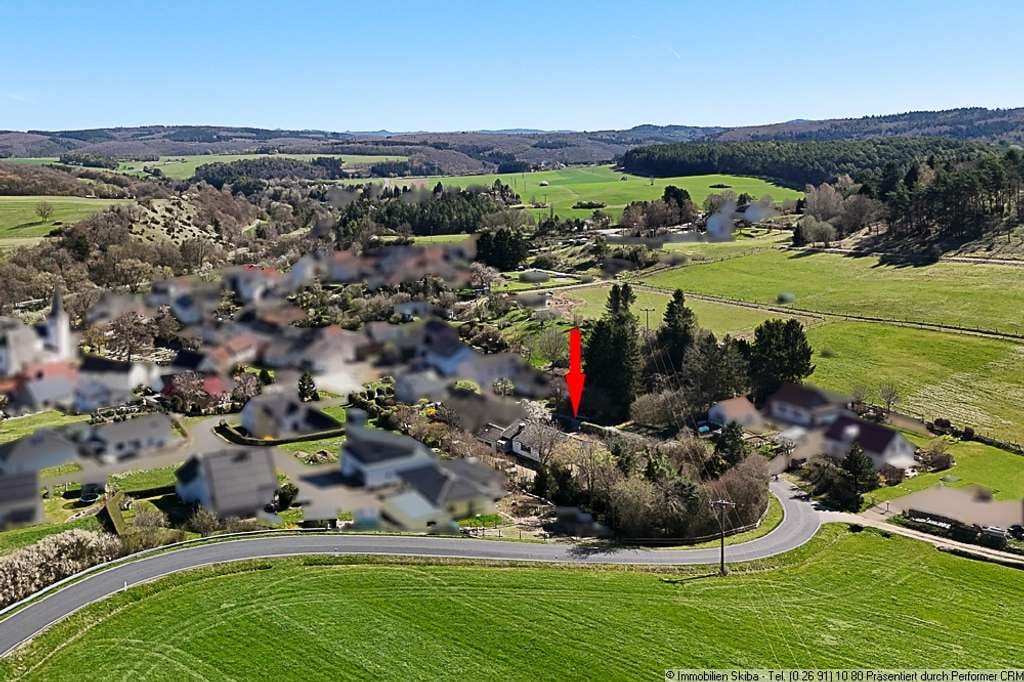 Immobilie in Üxheim - Weitläufiges Grundstück am Ortsrand: Bungalow mit Doppelgarage - Bild 2