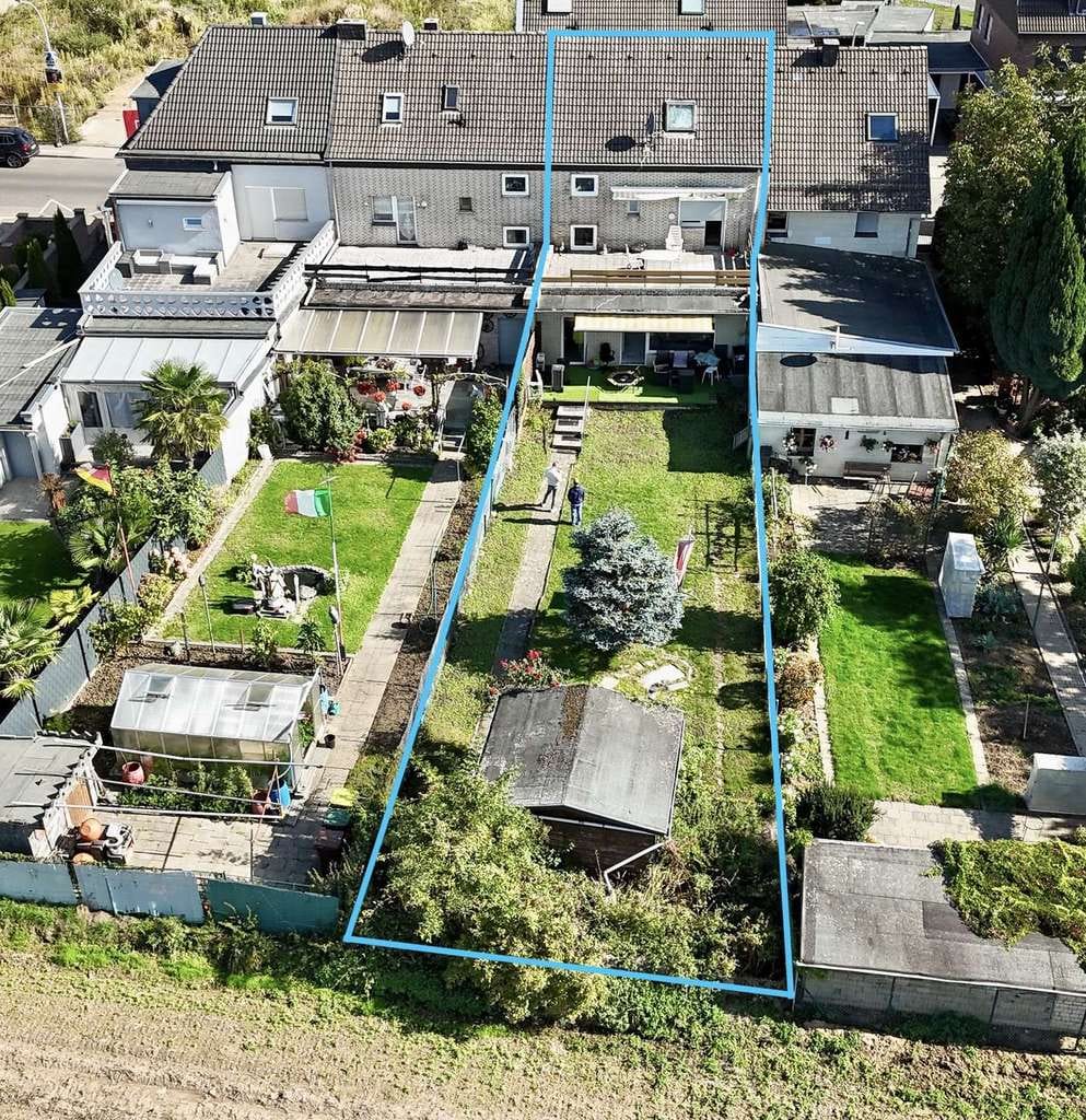 Immobilie in Jüchen - Jüchen I Charmantes Reihenmittelhaus mit Anbau auf 180m² Wfl und 350m² Grund mit Garten & Feldblick - Bild 2
