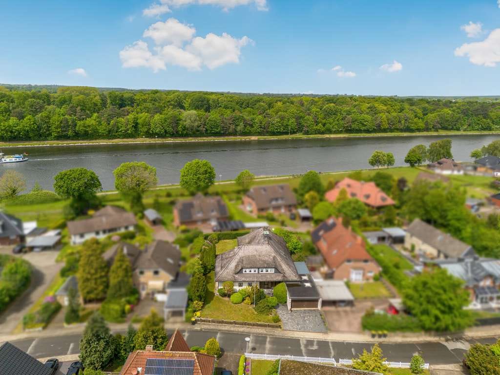 Immobilie in Westerrönfeld - Großzügigkeit trifft Kanallage – ein Zuhause mit Perspektive - Bild 1
