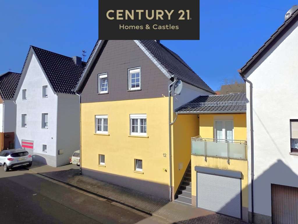 Immobilie in Quierschied - Attraktives Einfamilienhaus mit Balkon, Garage und Garten in ruhiger Wohnlage in Quierschied - Bild 0