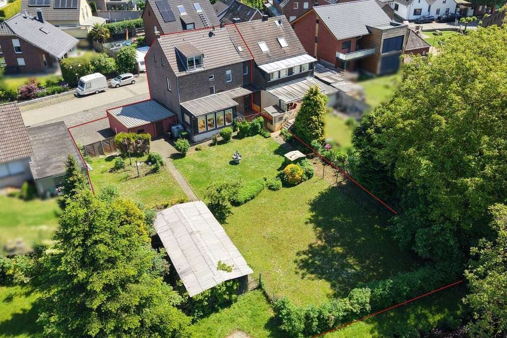 Immobilie in Rommerskirchen - Doppelhaushälfte mit einem zweiten Baugrundstück - Bild 0