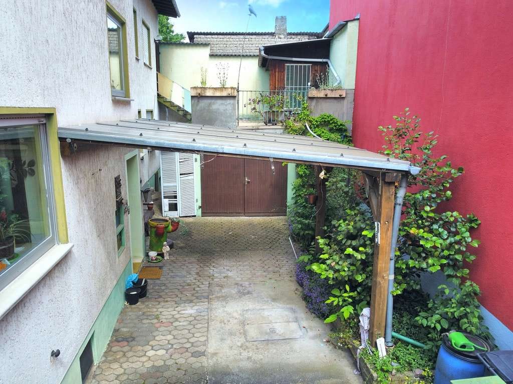 Immobilie in Neuwied - Einfamilienhaus mit Innenhof und Garage in Heimbach - Bild 1