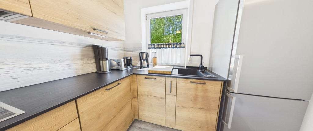 Immobilie in Meeder - Split-Level-Erdgeschosswohnung 
mit Terrasse, Garten und Garage in ruhiger Lage - Bild 3