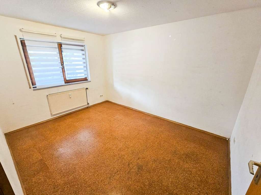 Immobilie in Straubenhardt - Attraktives Mehrfamilienhaus mit 3 Wohneinheiten und Entwicklungspotenzial - Bild 4
