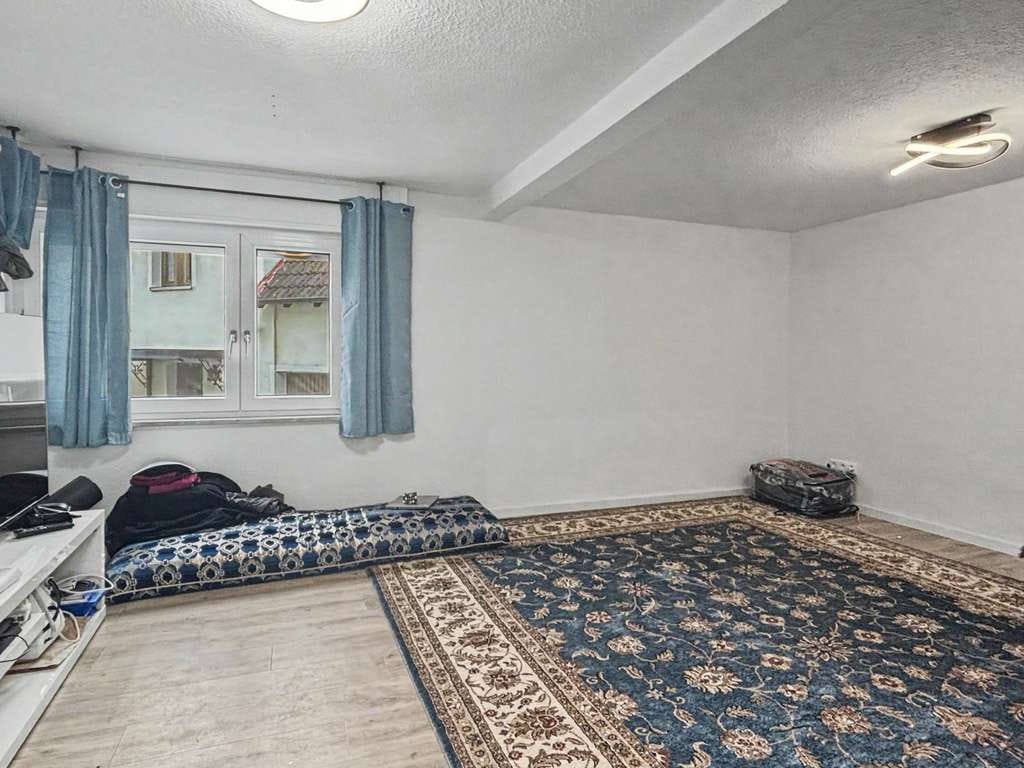 Immobilie in Ötigheim - Ruhig gelegenes, vermietetes Zweifamilienhaus in Ötigheim – Wohnen, vermieten oder kombinieren - Bild 3