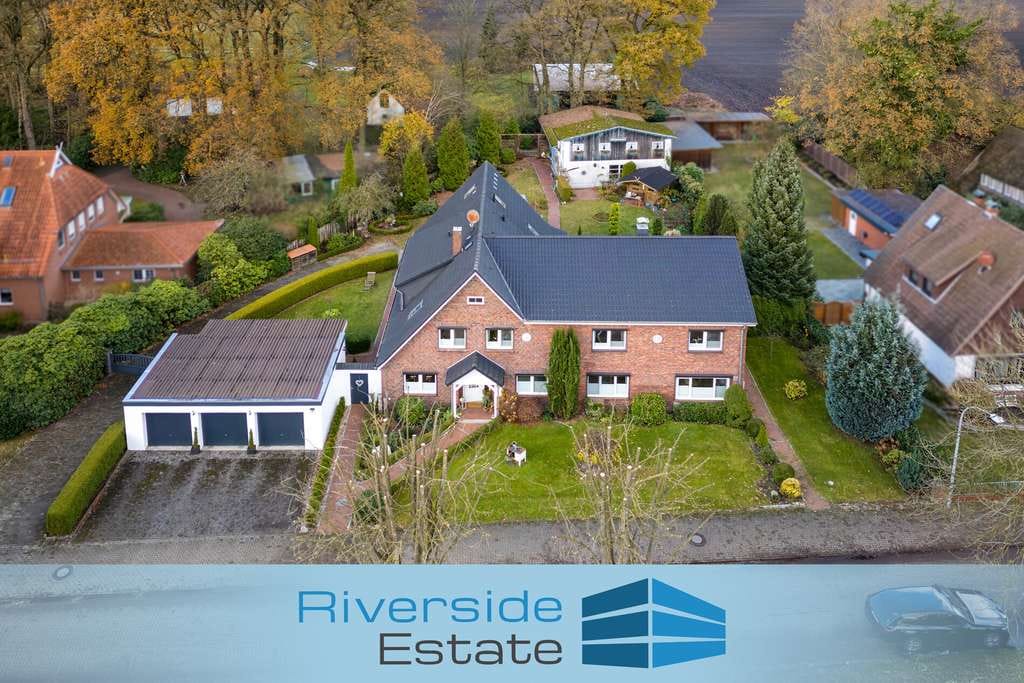 Immobilie in Lauenbrück - Mehrfamilienhaus mit großem Garten und vielseitigen Optionen – ideal fürs Mehrgenerationenwohnen - Bild 0