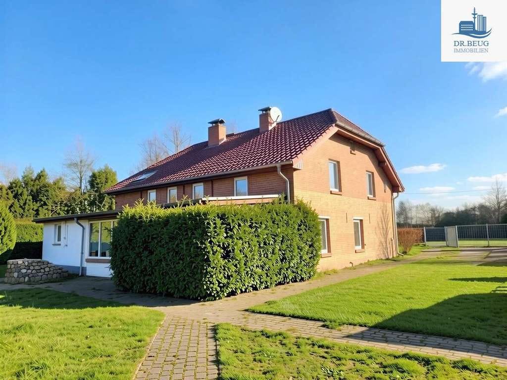 Immobilie in Poseritz - +++ Wohn- und Ferienhaus in Hafennähe mit 2 Wohnungen, EBK, Nebengebäude und Baulandreserve +++ - Bild 0