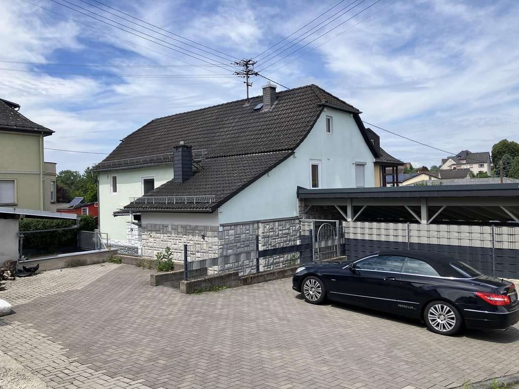 Immobilie in Maxsain - Freistehendes Einfamilienhaus mit Innenhof und Carport in zentraler Lage von Maxsain - Bild 0