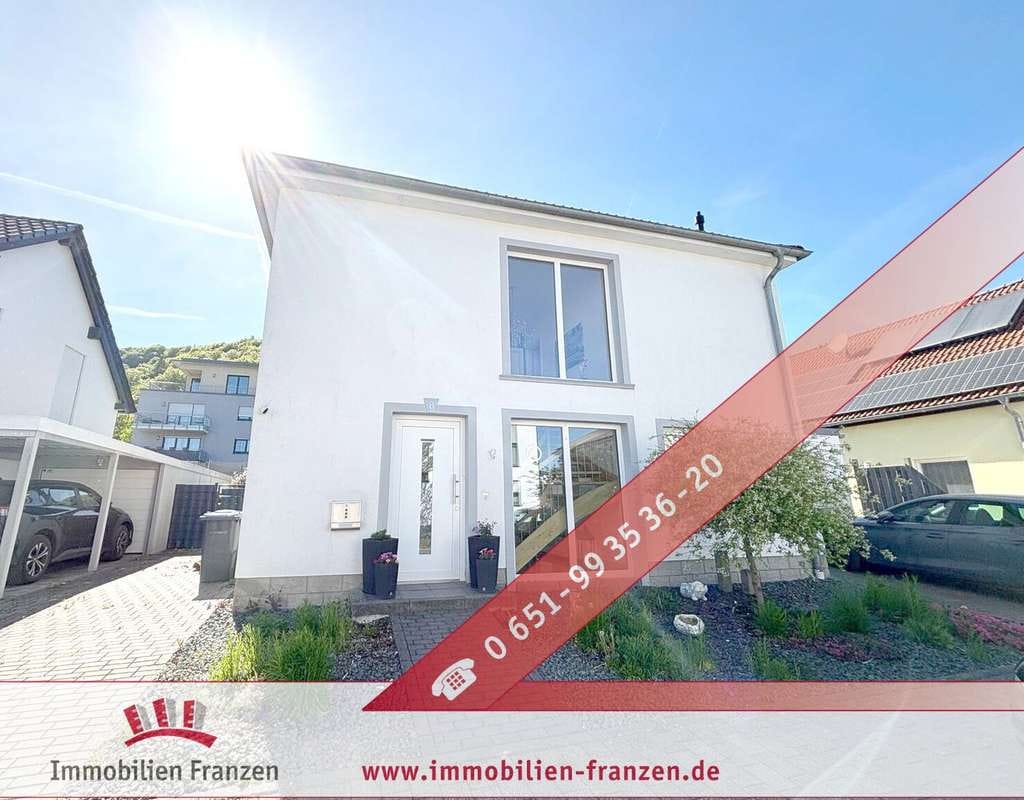 Immobilie in Tawern - Neuwertiges Einfamilienhaus mit Garten und Kamin - Bild 0