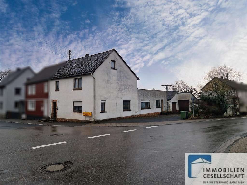 Immobilie in Schenkelberg - Geräumiges Einfamilienhaus für Selbermacher und Alleskönner! - Bild 0