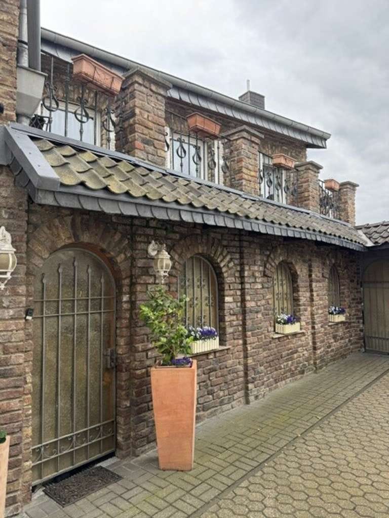 Immobilie in Titz - Charmante Doppelhaushälfte mit großem Grundstück und traumhaftem Garten - Bild 0