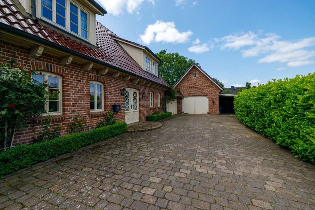 Immobilie in Todesfelde - Charmantes Einfamilienhaus im Landhausstil in Feldrandlage - Bild 1