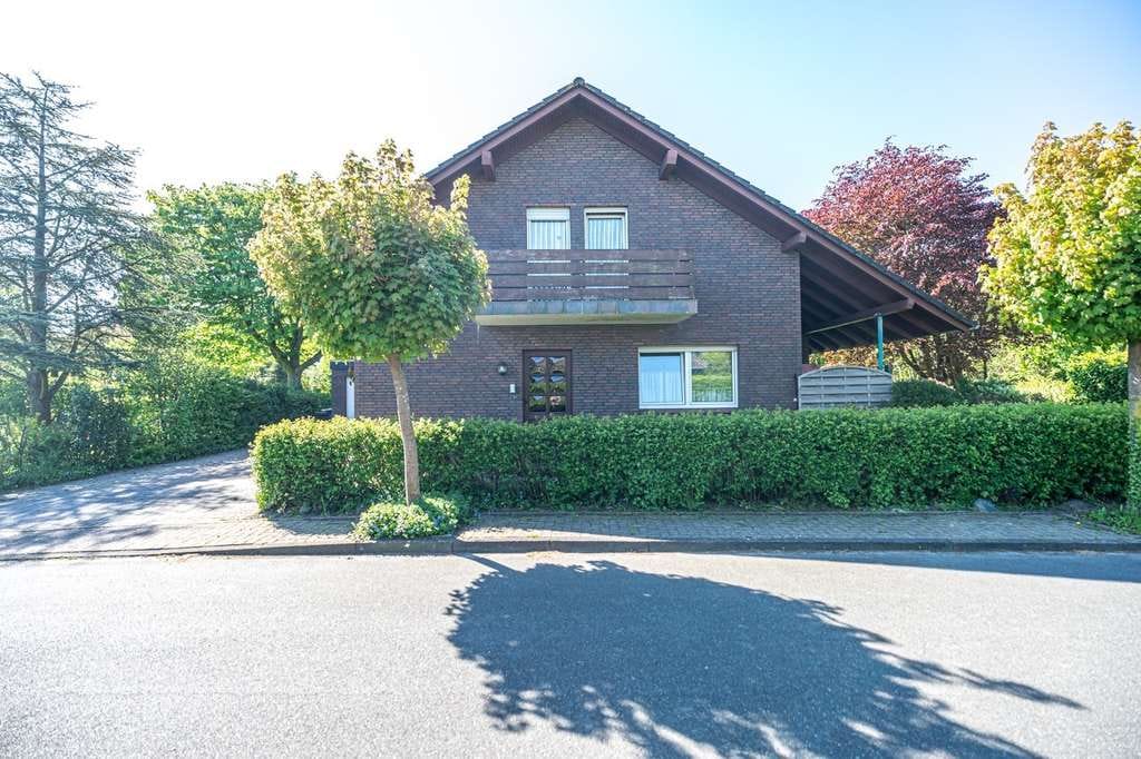 Immobilie in Wangerland - Charmantes, vermietetes Einfamilienhaus mit Garage in ruhiger Lage von Wangerland-Minsen - Bild 1